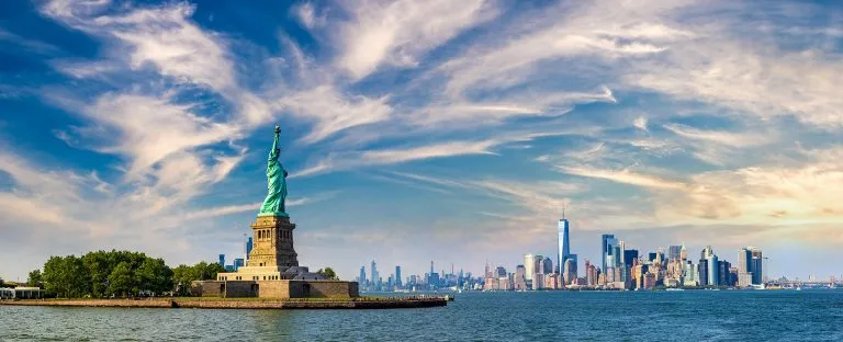 The Statue of Liberty with the Manhattan skyline in the background, New York
